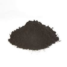 Activated_Charcoal powder on a white background